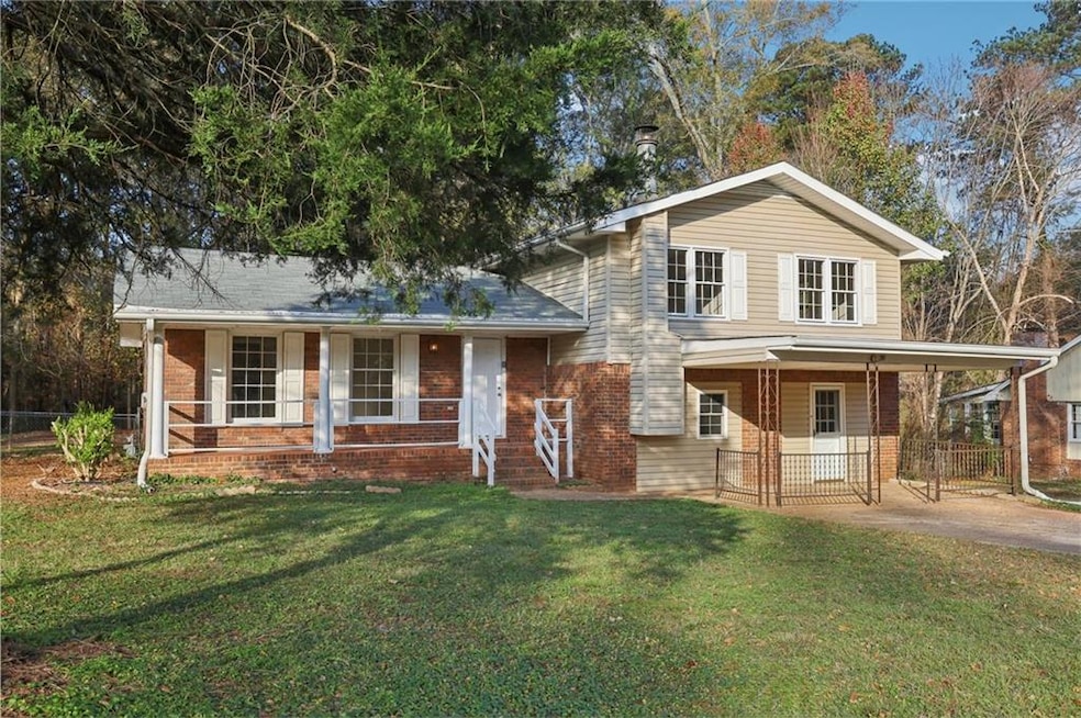 View of front of property featuring a front yard a