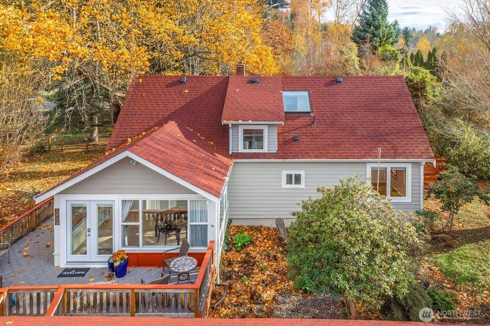 Welcome to the coolest and most unique home you have the opportunity to call home in all of Enumclaw.