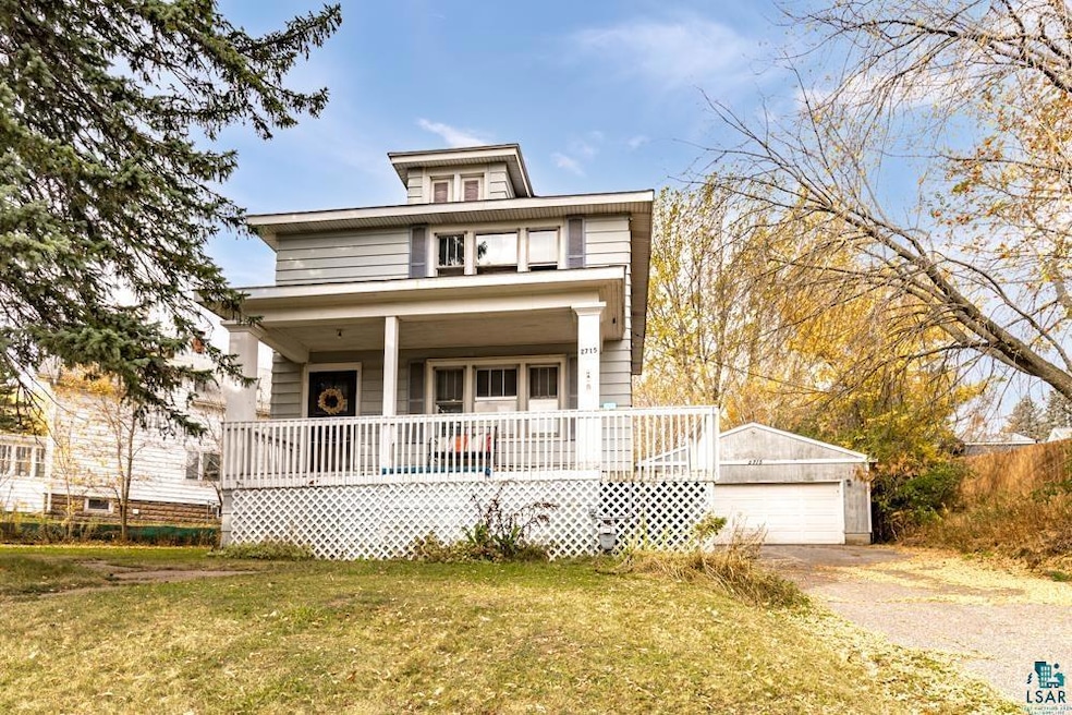 View of front of house featuring covered porch, an