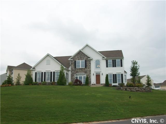 Exterior Front Beautiful expansive home on corner 