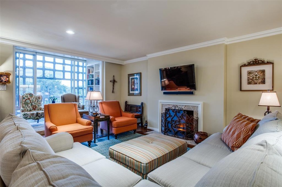 Living room with electric fireplace. Flat screen T