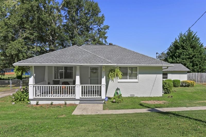 Absolutely charming 4-sides brick bungalow has jus