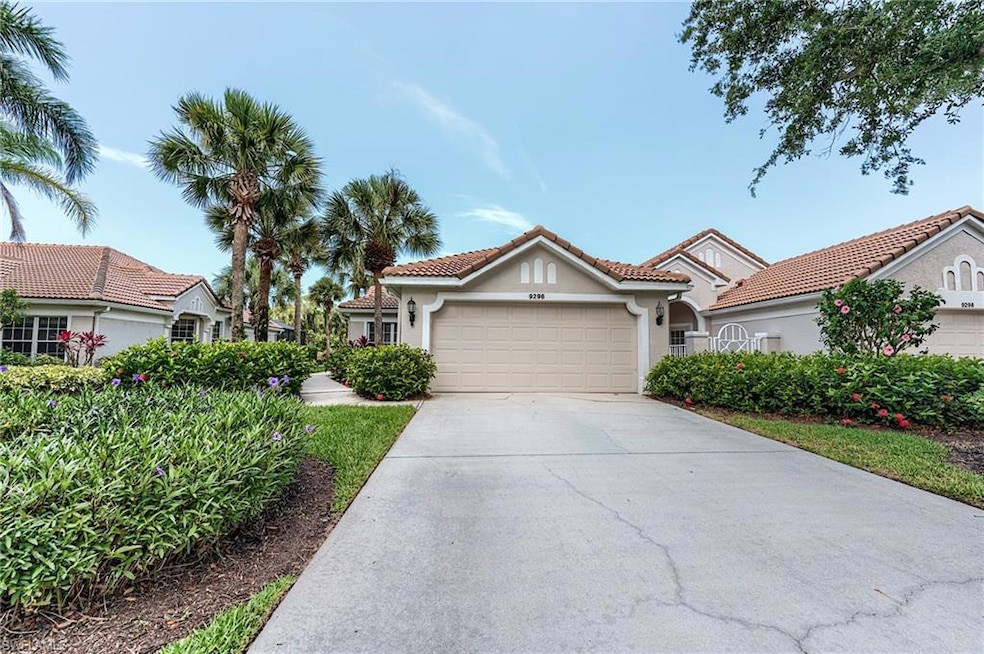 Mediterranean / spanish-style home with stucco siding, driveway, a garage, and a tiled roof