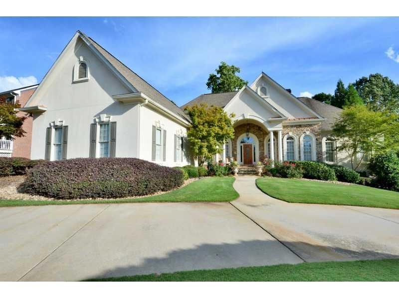 Exterior Front. Custom Ranch with 4 Sides Hardcoat