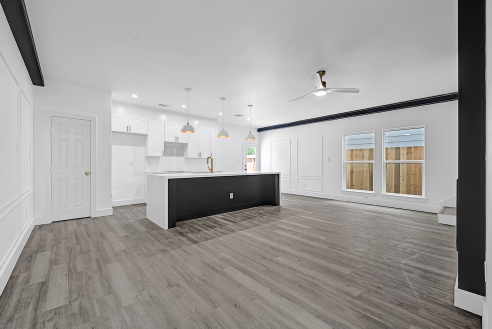 Expansive living and dining area with modern finis