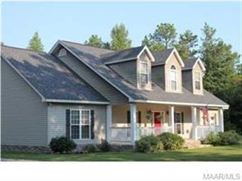 This beautiful home is situated on over 4 wooded a