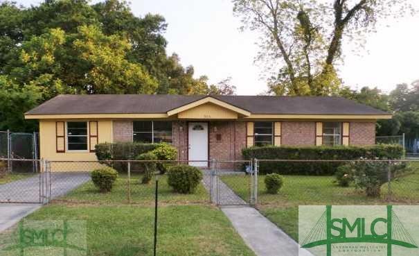 Exterior Front. Front Of Home With Fenced In Yard