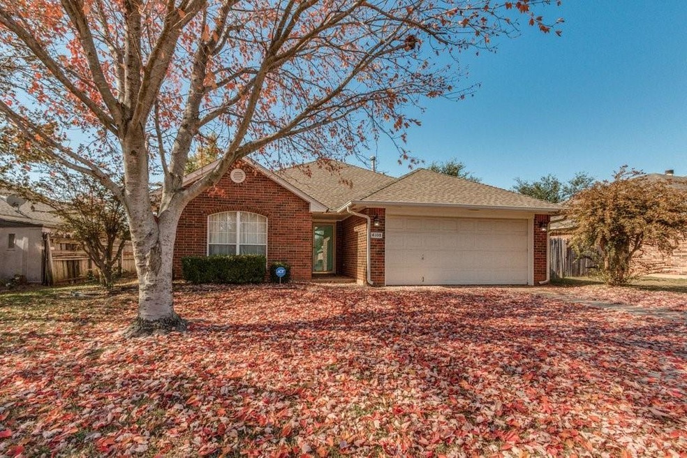 4108 Gyrfalcon Dr, Norman, OK 73072 - photo 1