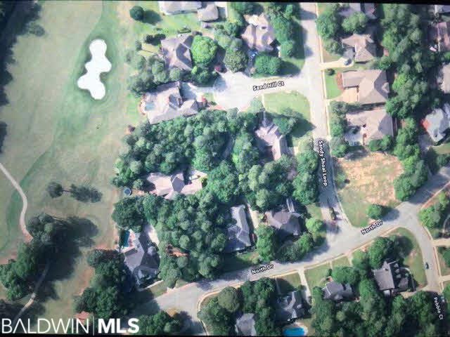 This aerial picture of Lot 429 depicts the view of how close this lot is the 14th & 15th fairways of the Rock Creek Golf Course.