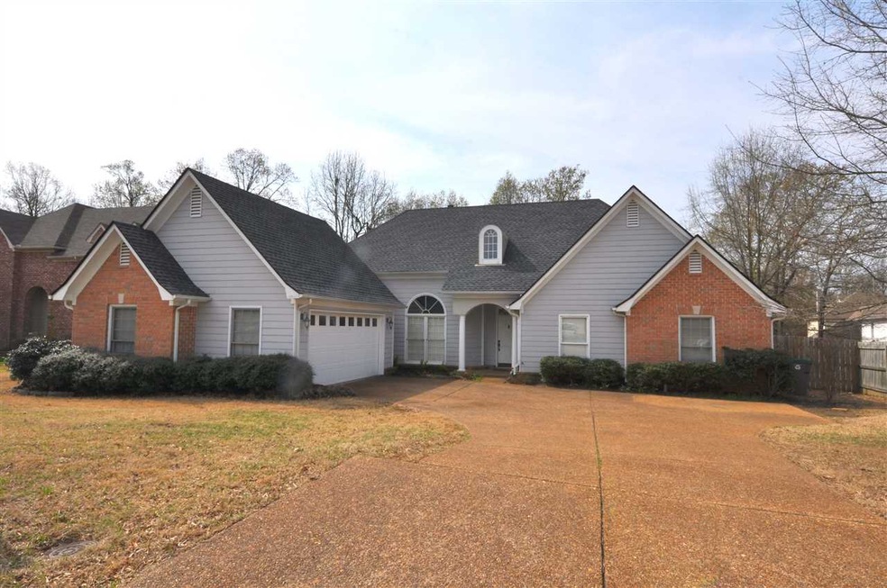 This home welcomes you with a low maintenance exte