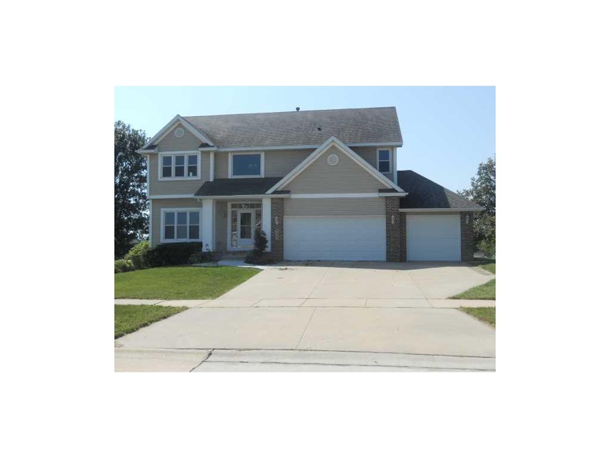 Front Exterior. Partial brick front, vinyl siding