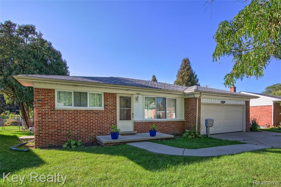 Front Elevation with 2 Egress window wells on South (left) side of the home.