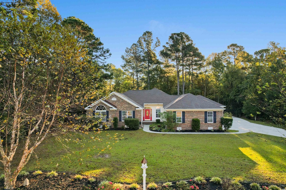 Ranch-style house with a front lawn, brick siding, and a shingled roof