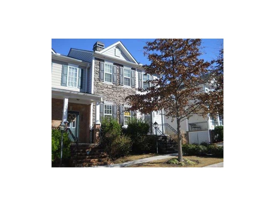 Exterior Front. Terrific end unit townhome in desi