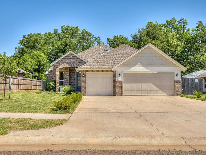 View of front of home featuring a garage and a fro