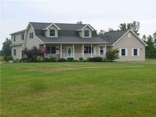 Exterior Front. Best of both worlds-country living