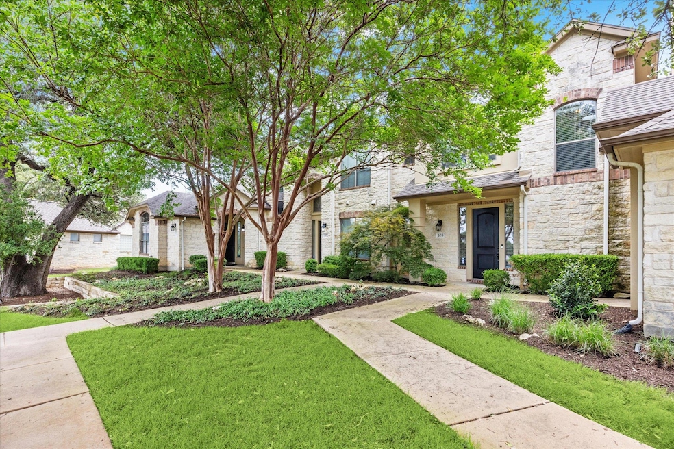View of front of property featuring stone siding 