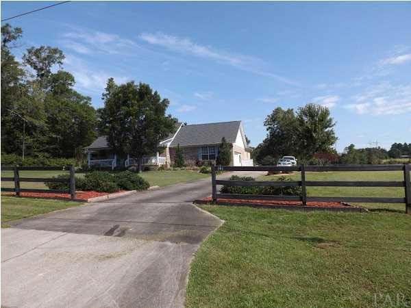 Long private driveway to a beautiful home