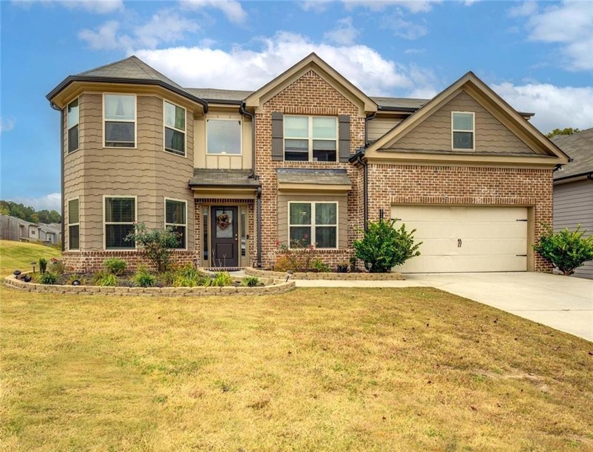 View of front of house featuring a front yard