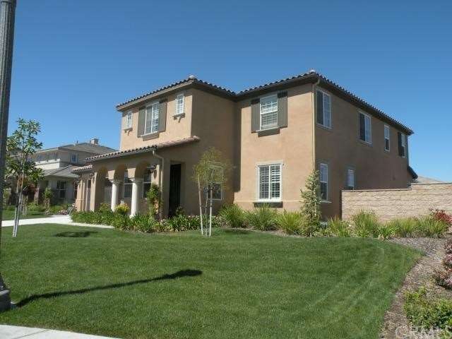 Large corner homesite with block wall fencing