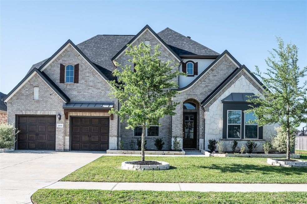 Welcome Home! This beautiful Ashton Woods Wesley home is seated on a large corner lot with no back neighbors!