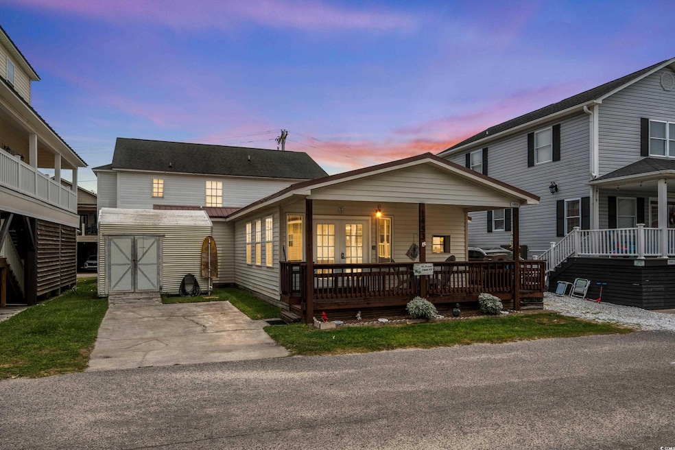 View of front of home featuring covered porch
