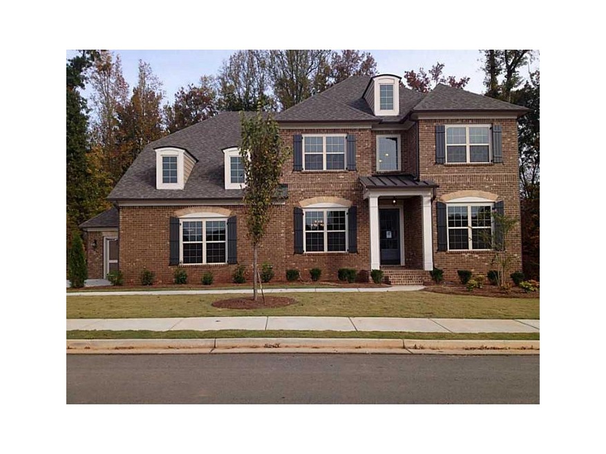 Exterior Front. Homesite 14 in Highlands at Johns 
