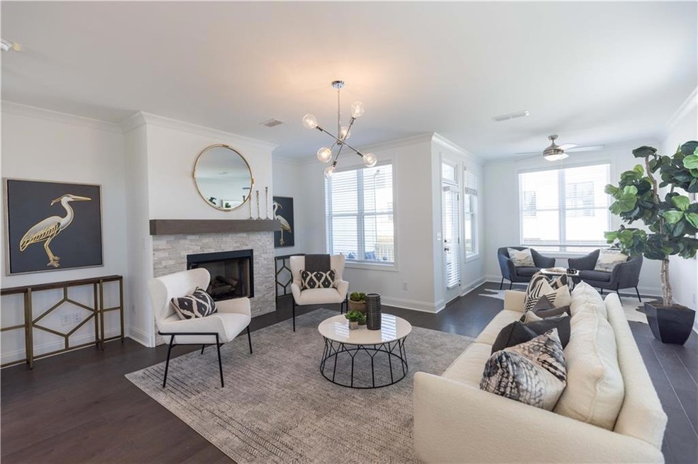 Spacious family room with cozy fireplace. Photos o
