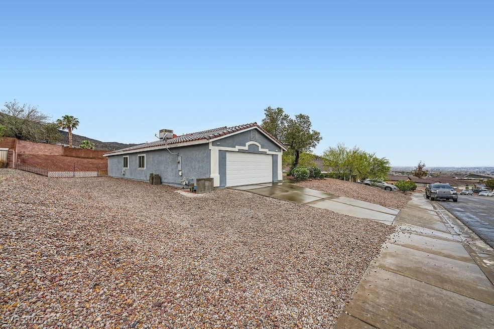 View of property exterior featuring a tile roof, c