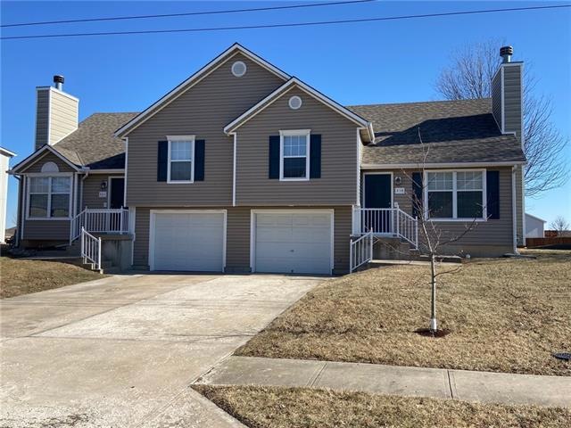 308 E Walnut St, Raymore, MO 64083 - photo 1