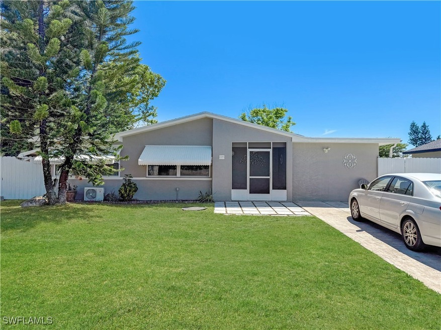 View of front of house with stucco siding