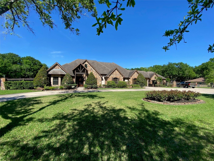 Street view of fantastic 4 bedroom home sitting on 1.2 acres in the county just outside the city limits of Pearland