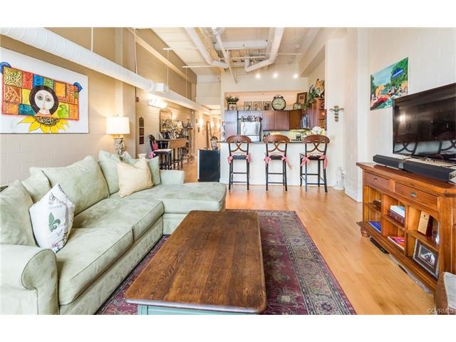 Spacious, light filled living area with open floor