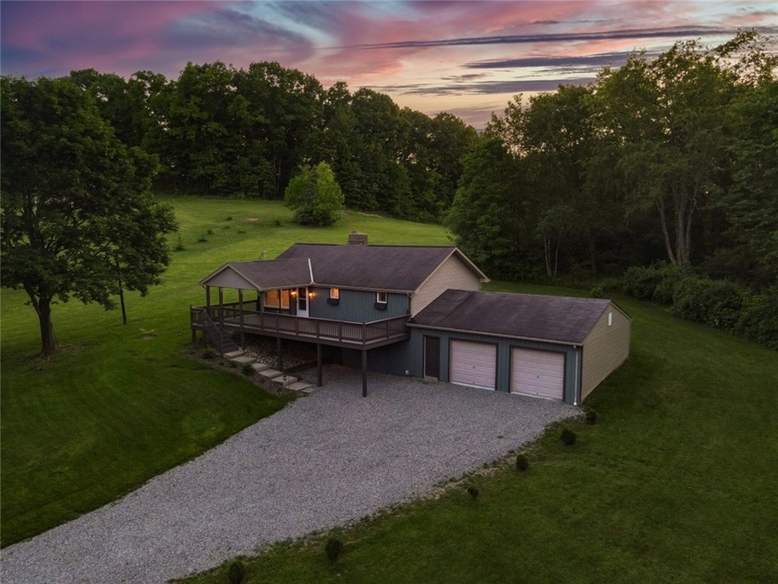 Homes & land style setting at 1381 Logan Rd.
