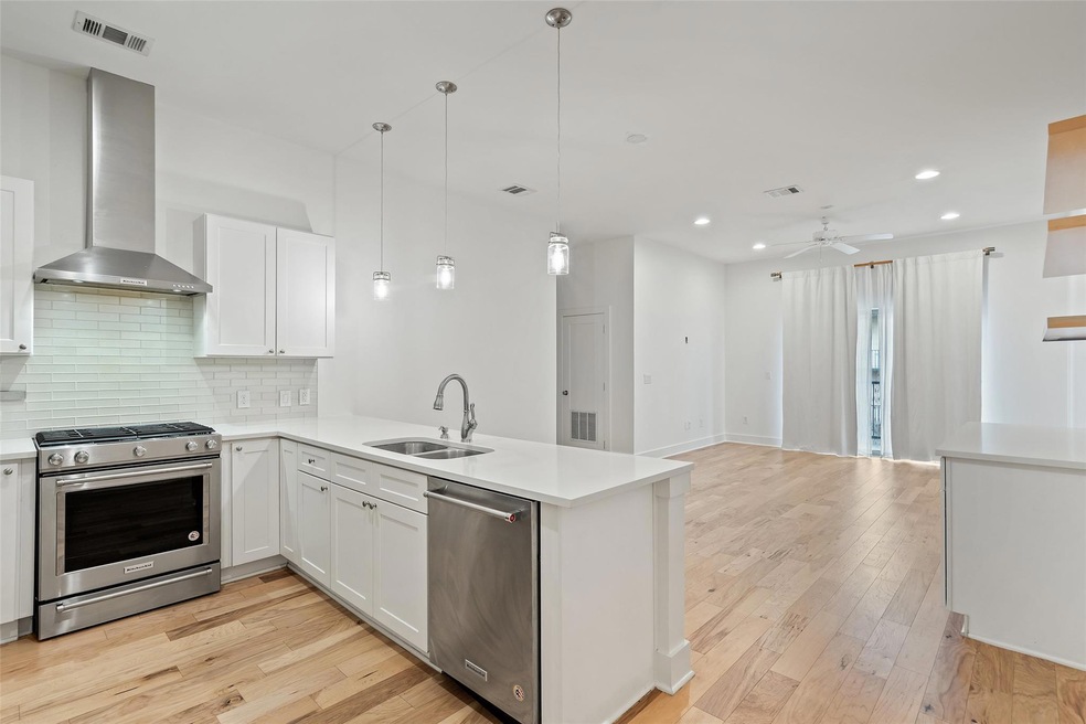 Kitchen featuring appliances with stainless steel