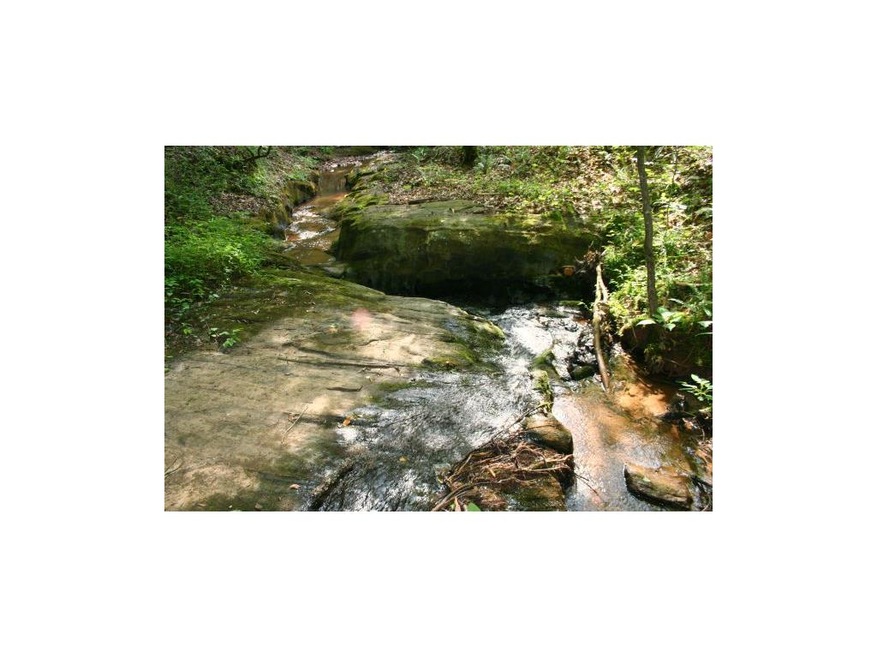 Waters slide between the rocks