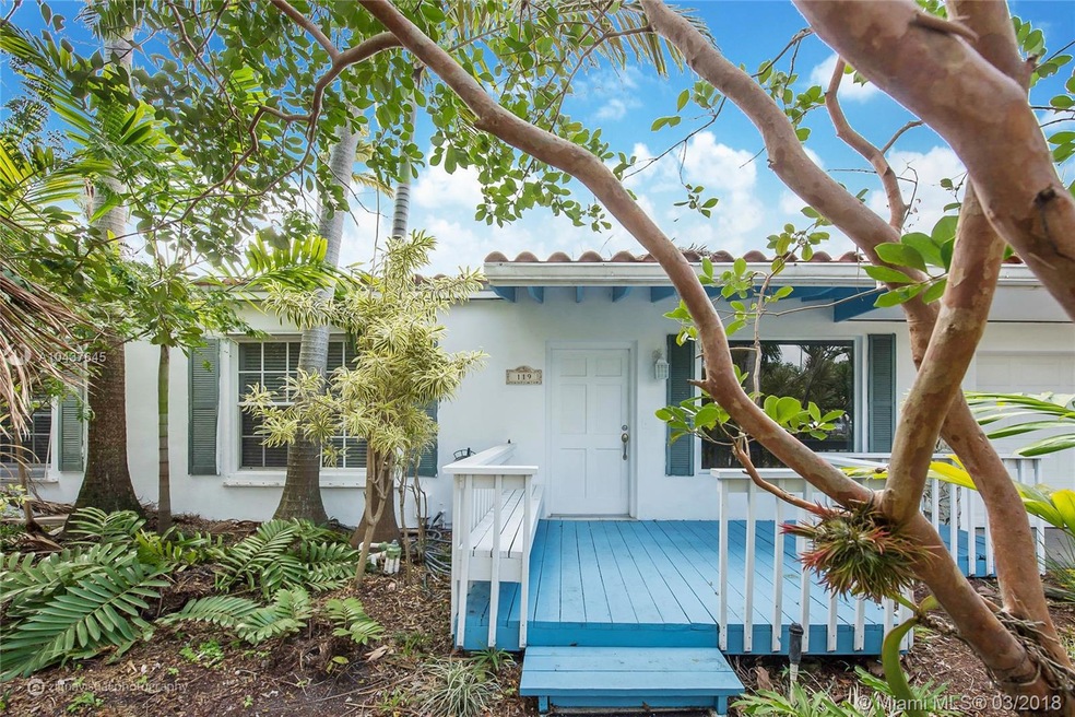 Beach House entrance with lush garden