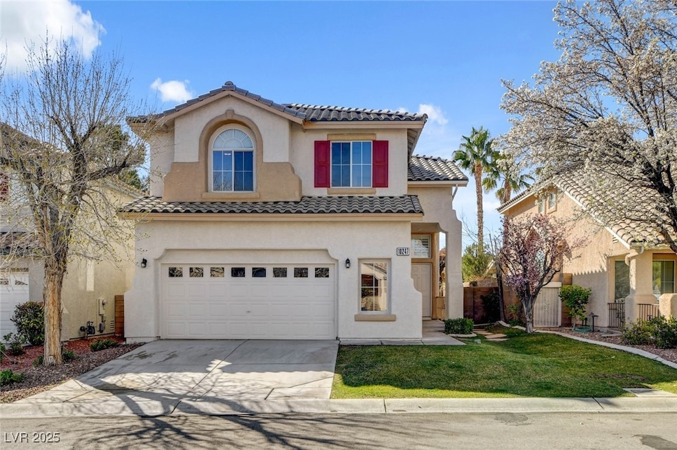 Mediterranean / spanish house with fence, a garage