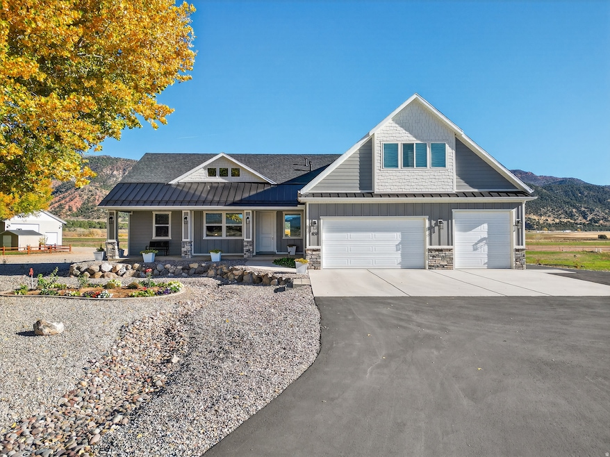 Craftsman-style house, Front porch, extra long RV parking, Xeriscape yard.