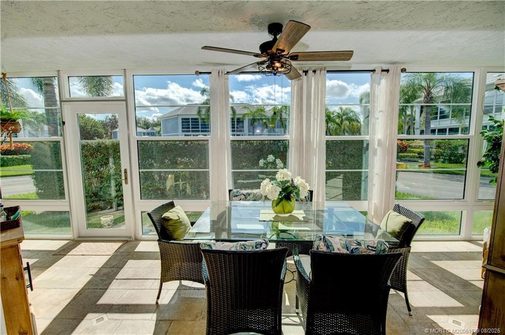 Beautiful Florida Room allows you to enjoy the sunlight while staying cool indoors! FULL Impact Windows!