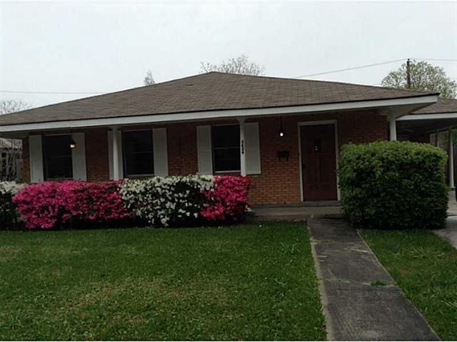 Facade/Exterior Front. Beautiful Azaleas give this