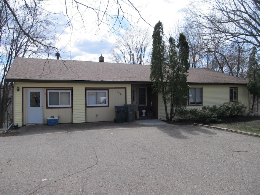 Front of Tri Plex faces West 8th Street