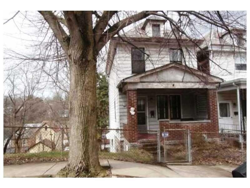 Exterior Front. Enclosed front porch.