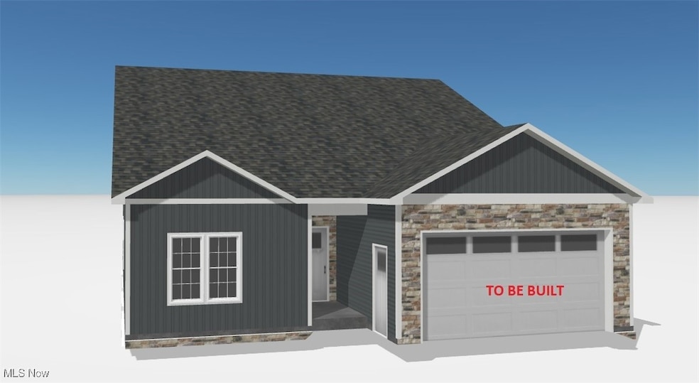 View of front of home featuring stone siding, an attached garage, and roof with shingles