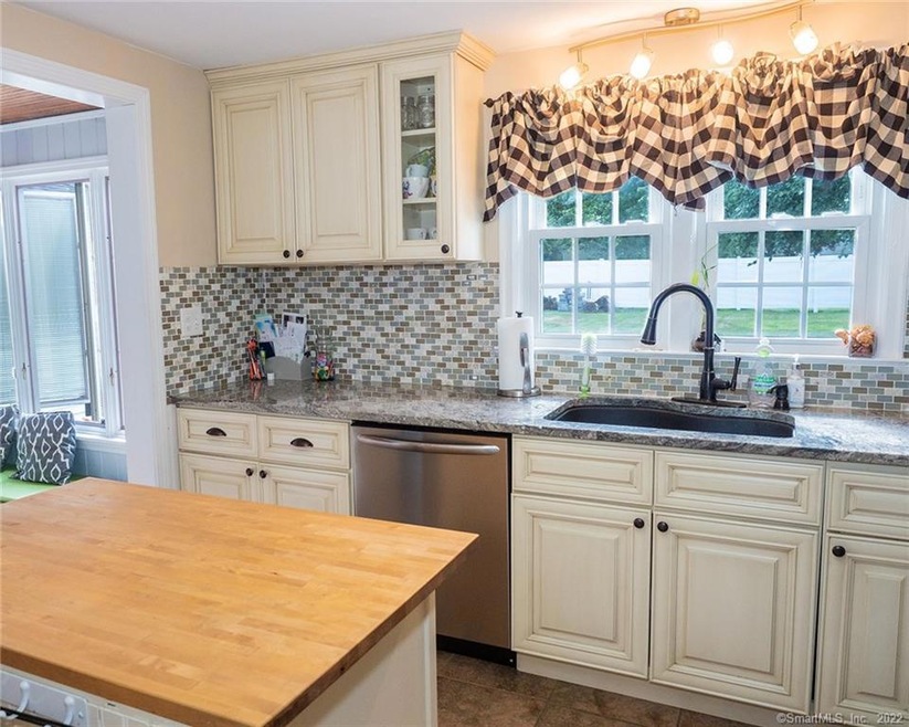 Beautiful granite counter tops with tile backsplas