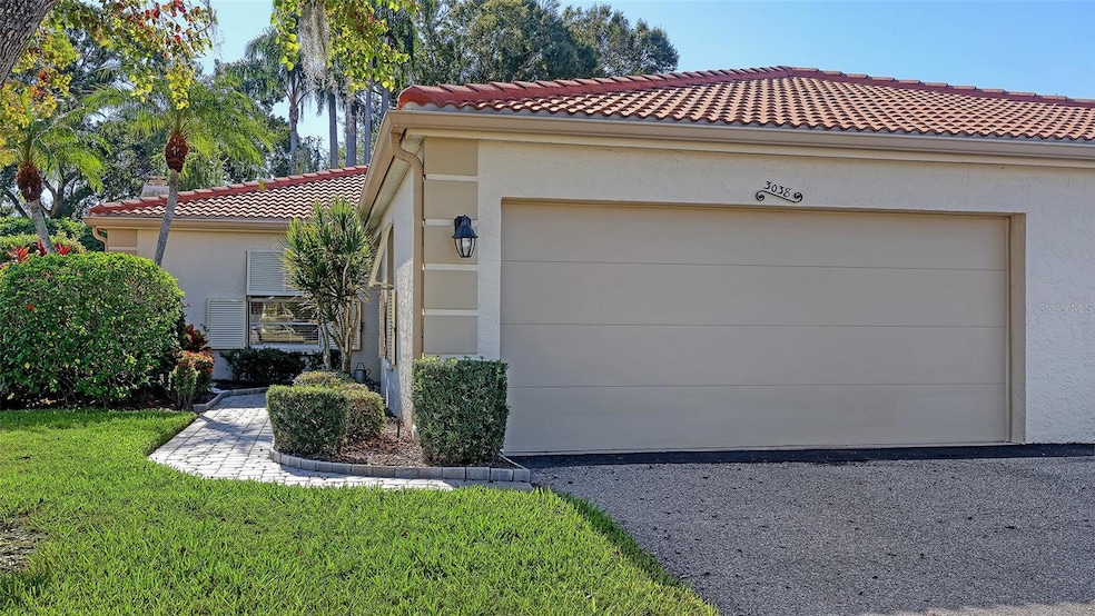 3038 Ringwood Meadow unit 20, Sarasota, FL 34235 - photo 1