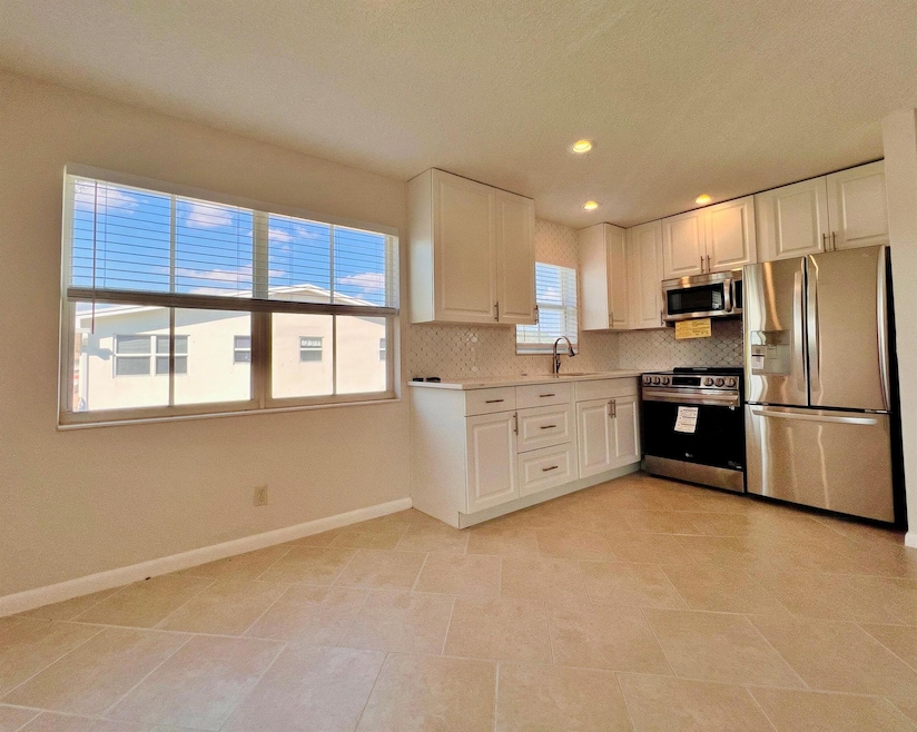 152 Chatham G, West Palm Beach, FL 33417 - photo 1