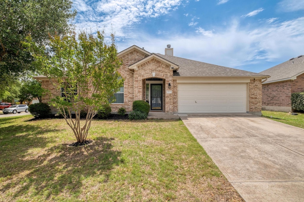 Traditional-style house featuring brick siding, a
