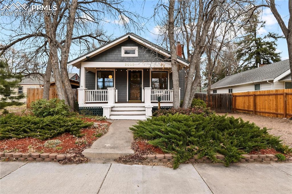 Craftsman-style home featuring covered porch