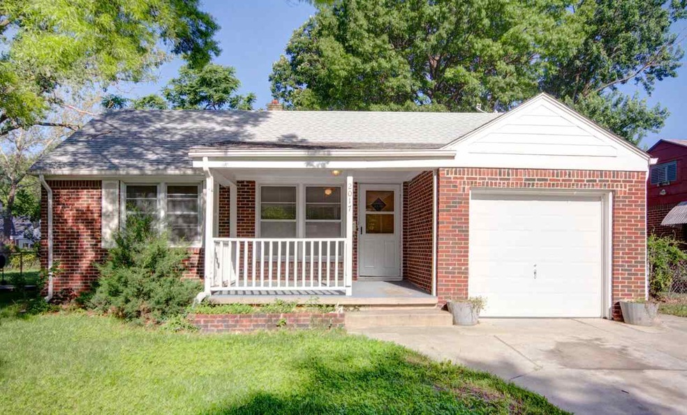 ROOMY- Has large addition to rear of home